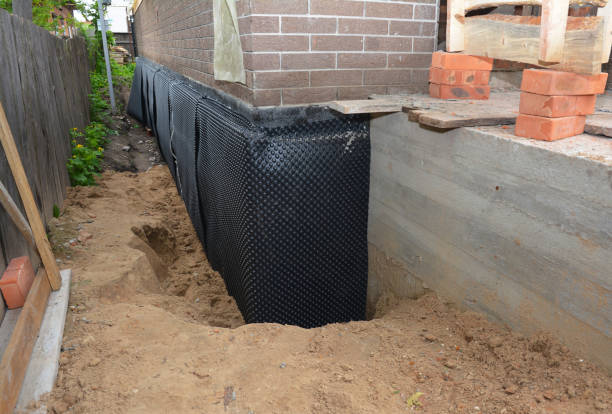 SJ Waterproofing Pros technician performing targeted Emergency Waterproofing assessment in Millersville, PA